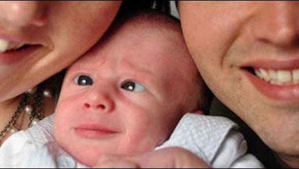 Parents and their newly adopted baby