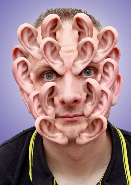 Man staring at you with ears all over his face