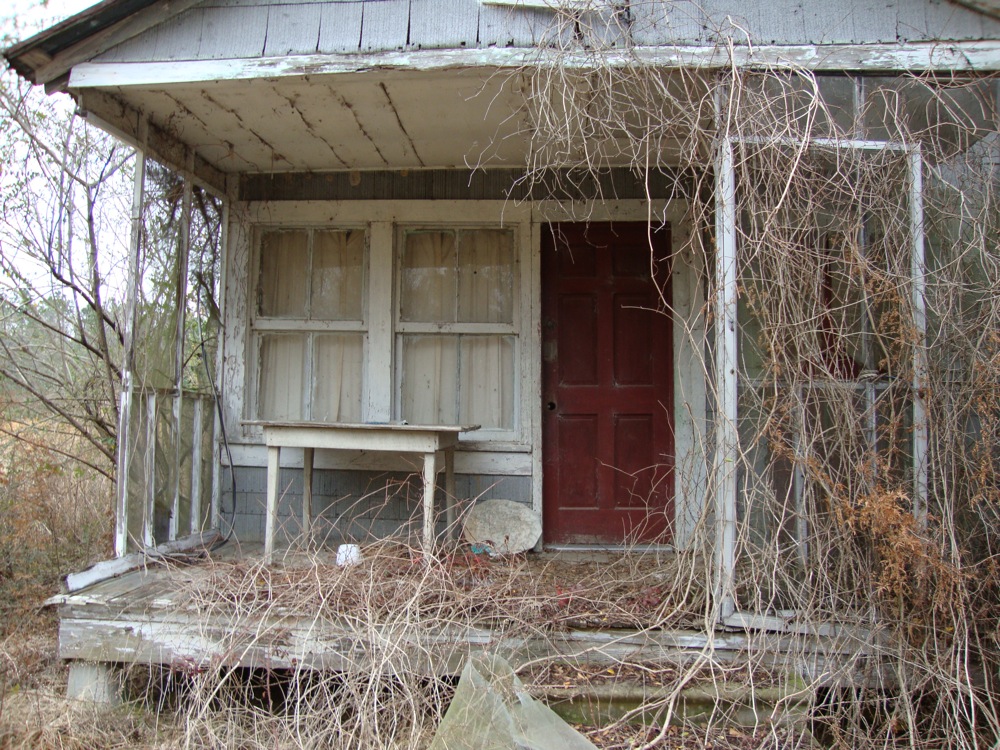 A dilapidated house owned by someone chasing the American Dream