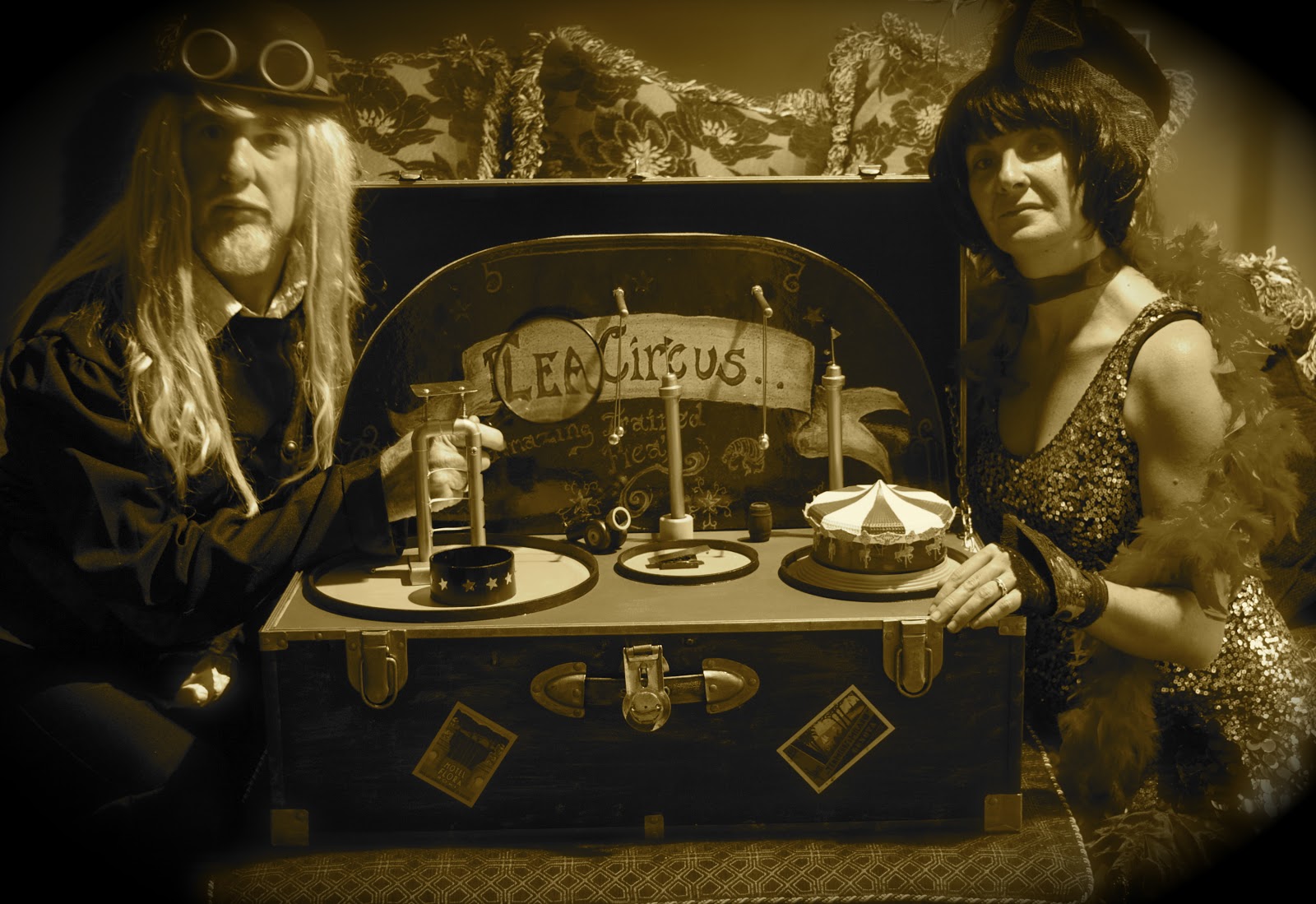 Man and woman pose with their flea circus