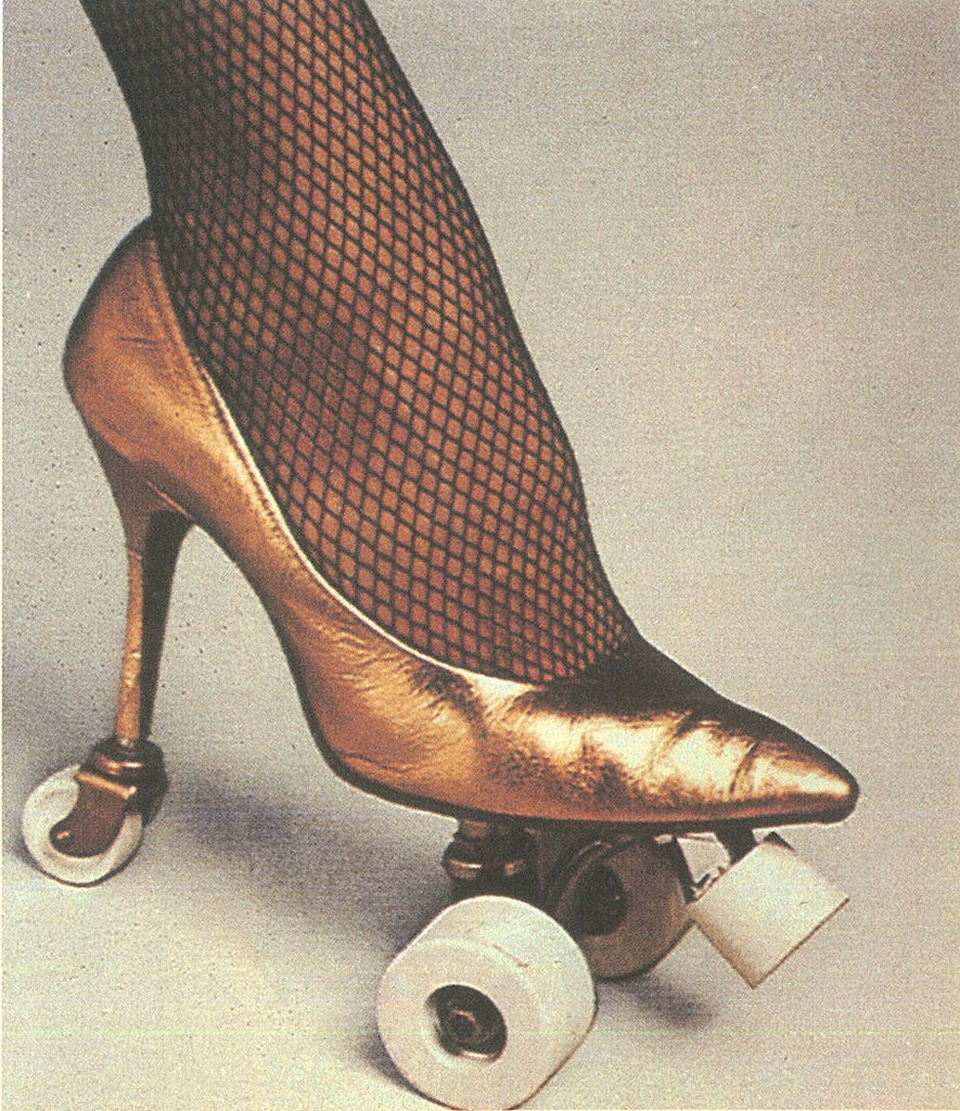 High heeled pump mounted on roller skates